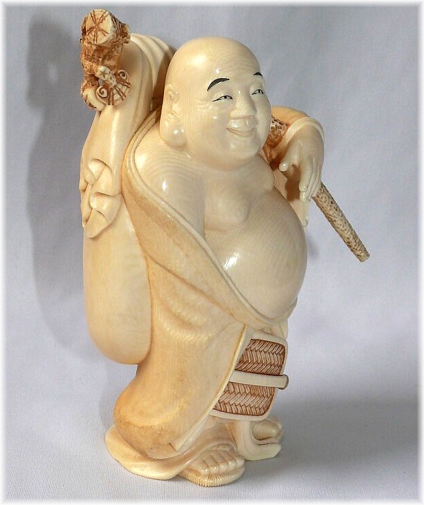 японская статуэтка окимоно из слоновой кости